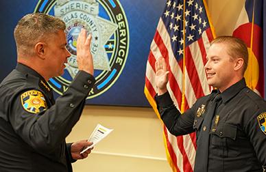 DCSO Deputy being promoted and sworn in by Sheriff Weekly